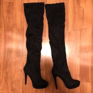 Over the knee high heel boots